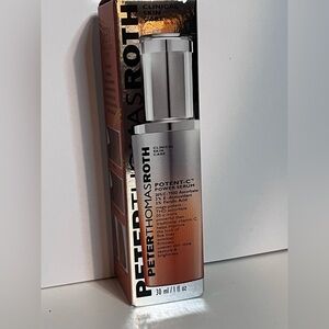 Peter Thomas Roth Potent-C Serum with Silver and Orange Design